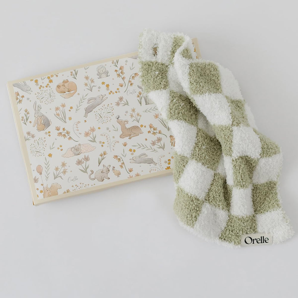 Orelle checkered lovey sage closeup fabric highlights plush texture for soothing baby touch