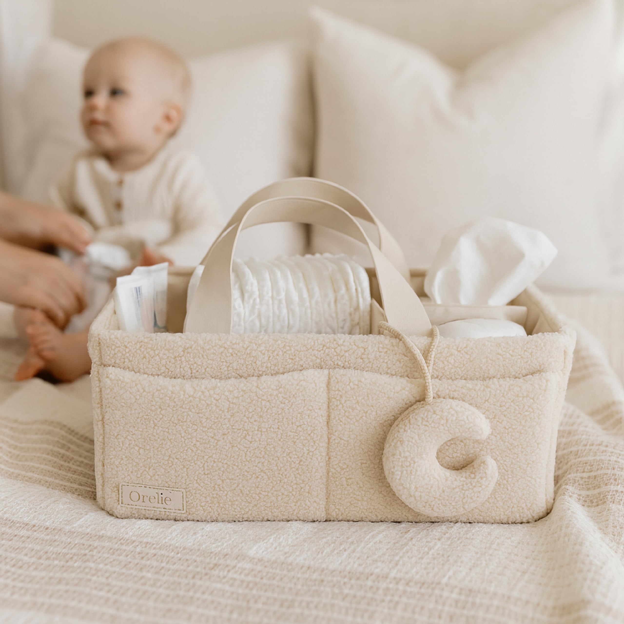 Orelle diaper caddy matching pouch cream sherpa showcases on-the-go organization for essentials
