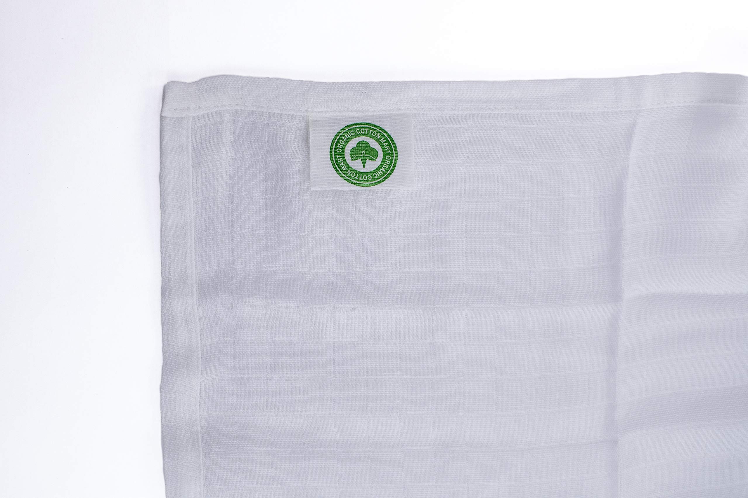 Organic Cotton Mart baby swaddling scene shows gender-neutral design for year-round comfort