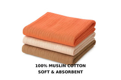 Organic muslin burp cloths soft close-up, highlighting breathable cotton and gentle touch.