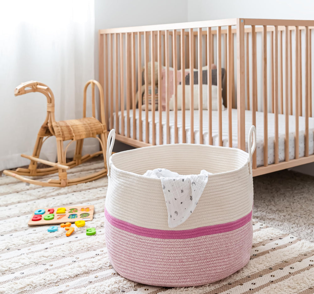 OrganiHaus blanket storage bin showcasing pink stripe weave perfect for living room or bedroom.