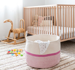 OrganiHaus blanket storage bin showcasing pink stripe weave perfect for living room or bedroom.