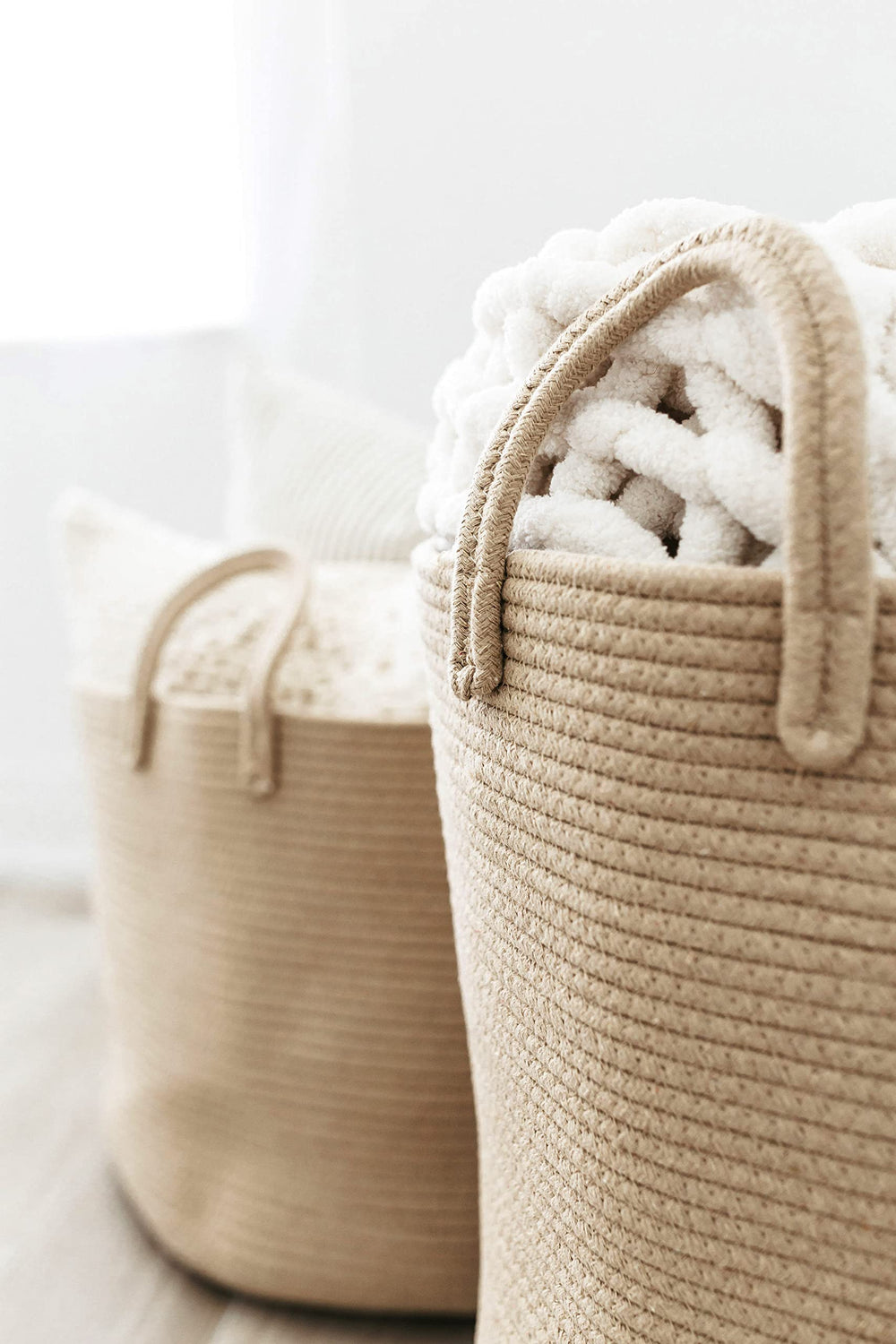 OrganiHaus storage basket helps tidy cushions and pillows gracefully.