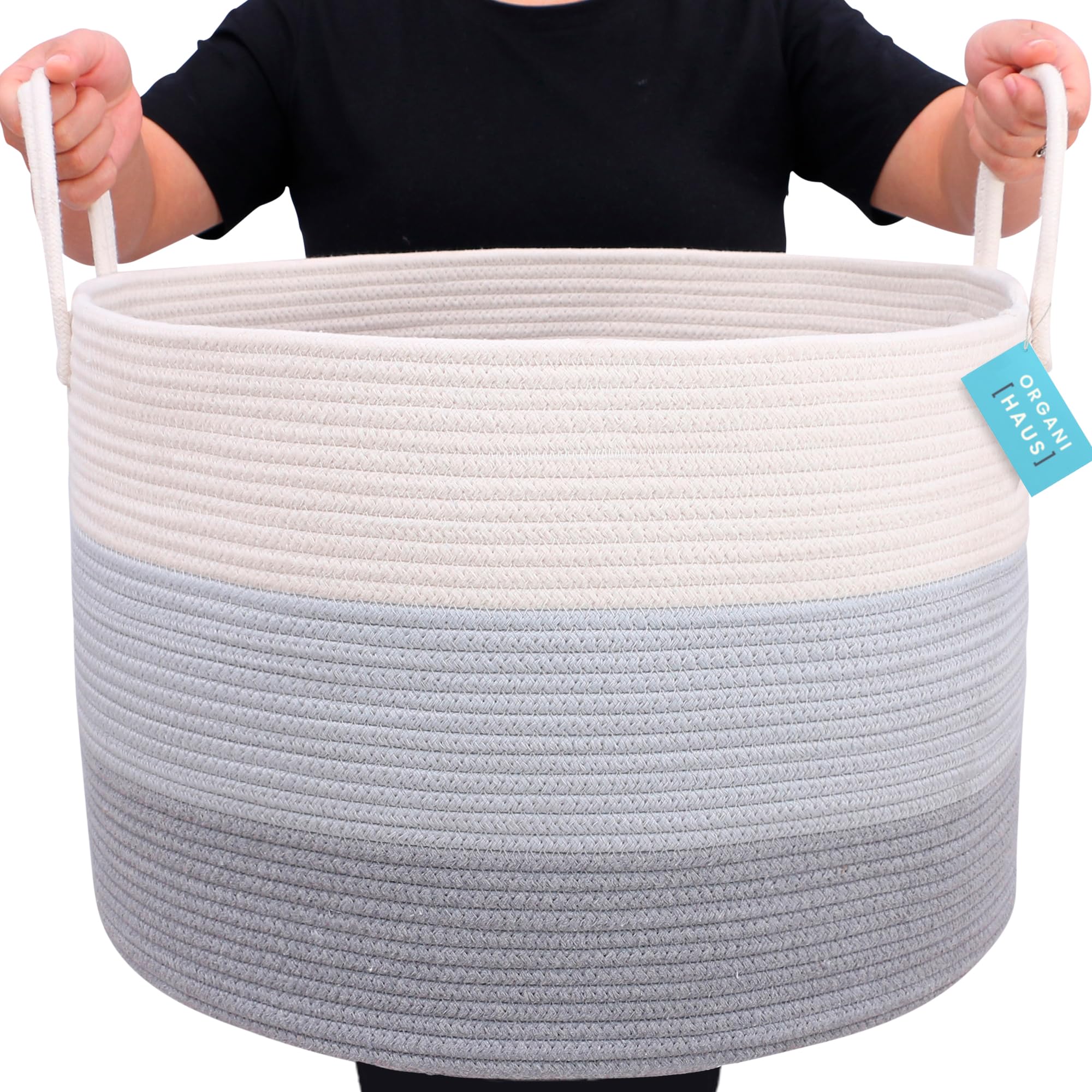 OrganiHaus large woven basket blanket storage holds folded towels in bedroom for cozy organization