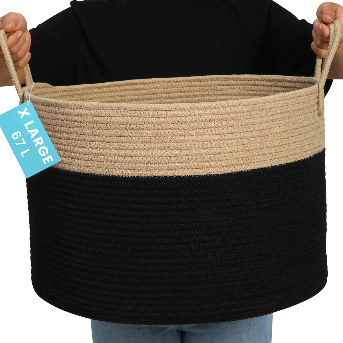 OrganiHaus large woven storage basket with blankets keeps living room organized.