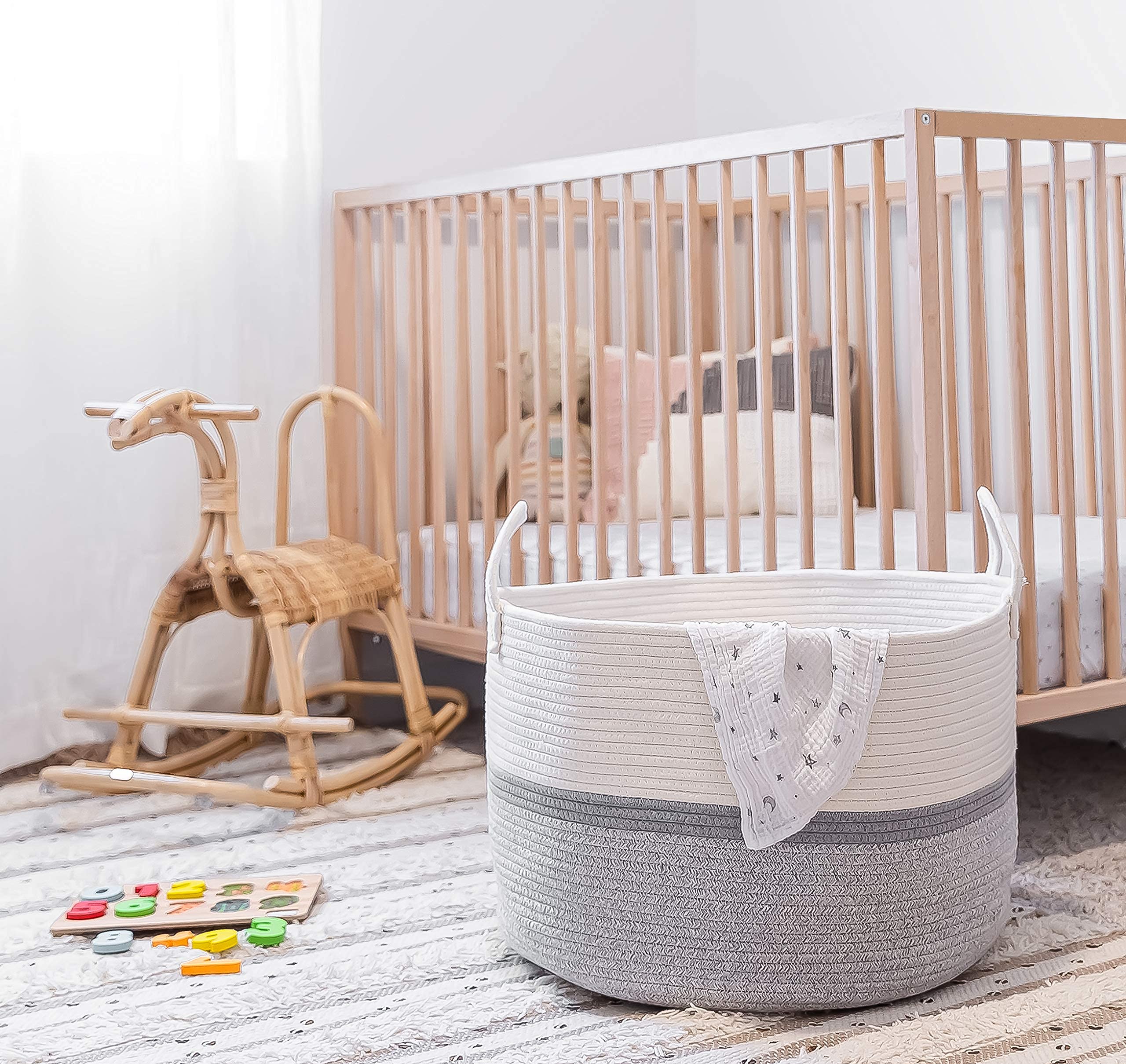 OrganiHaus decorative basket adds texture to living rooms with soft gray tones.