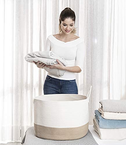 OrganiHaus nursery storage basket cradles cushions and pillows for a tidy kid-friendly space.