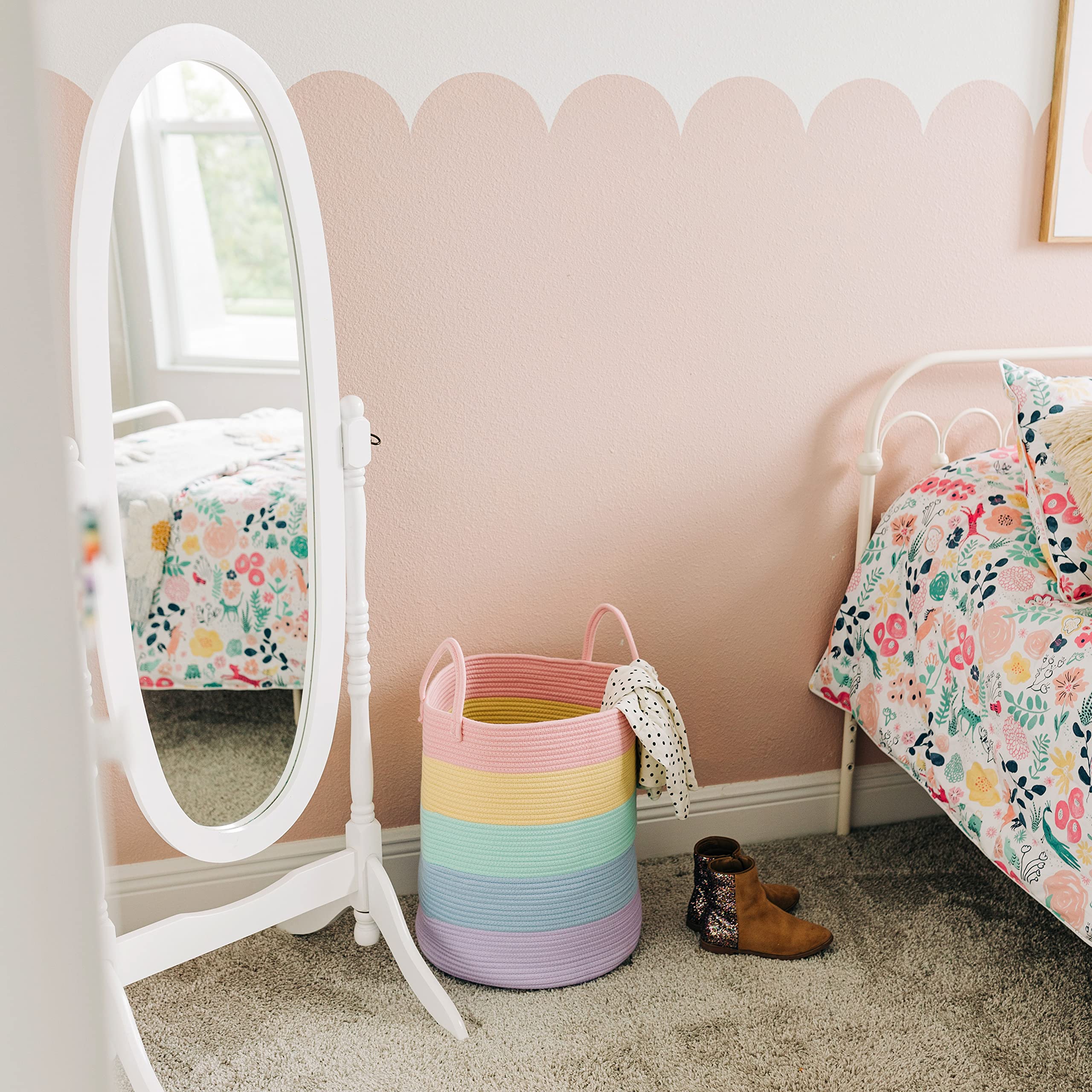 OrganiHaus rainbow basket doubles as blanket storage in living room