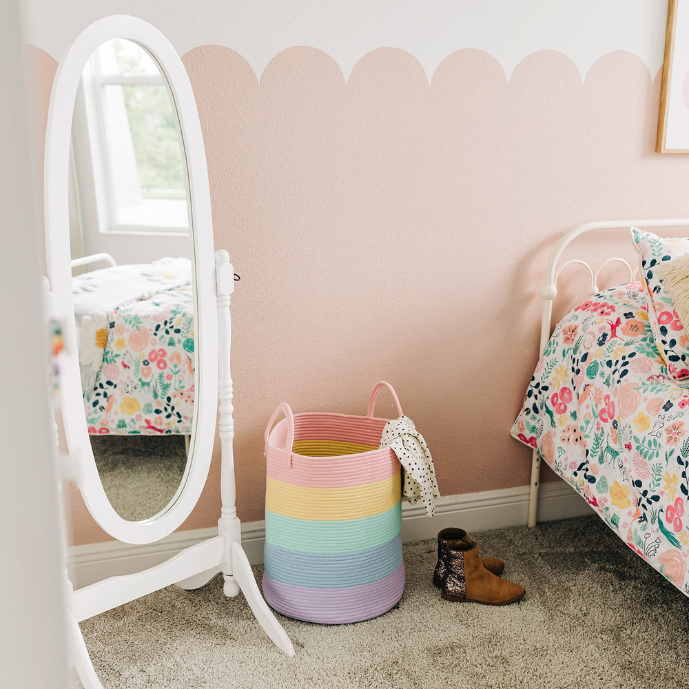 OrganiHaus rainbow basket doubles as blanket storage in living room