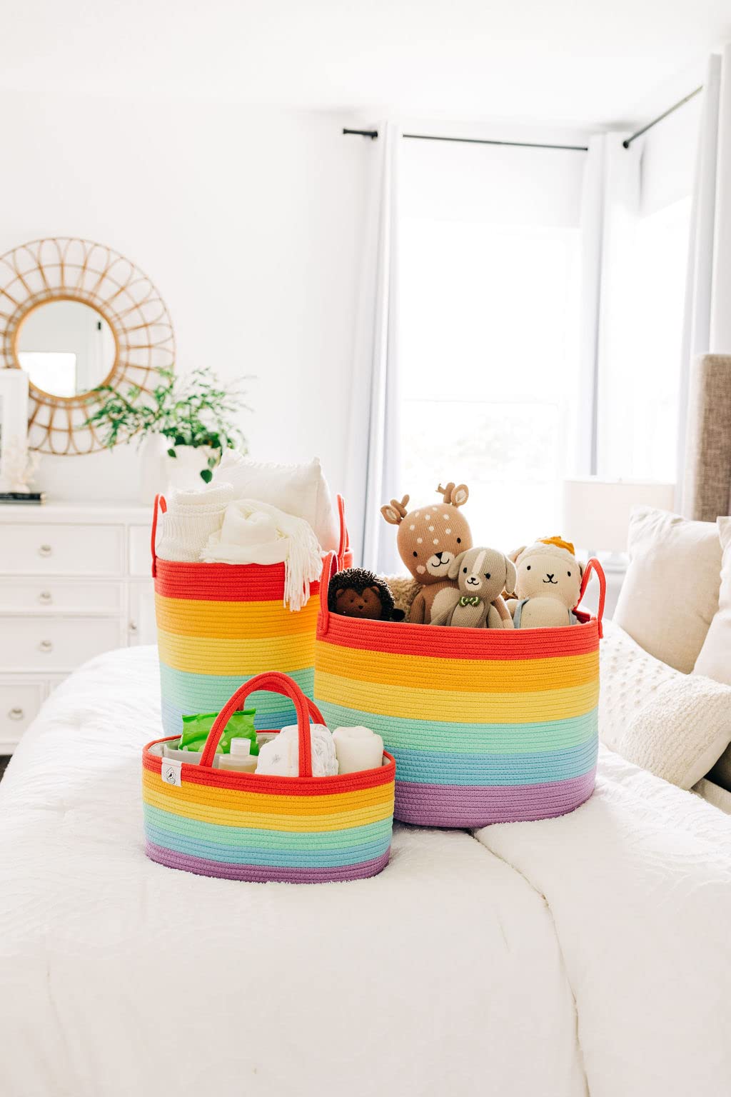 OrganiHaus rainbow woven basket in a room corner adds colorful storage charm.