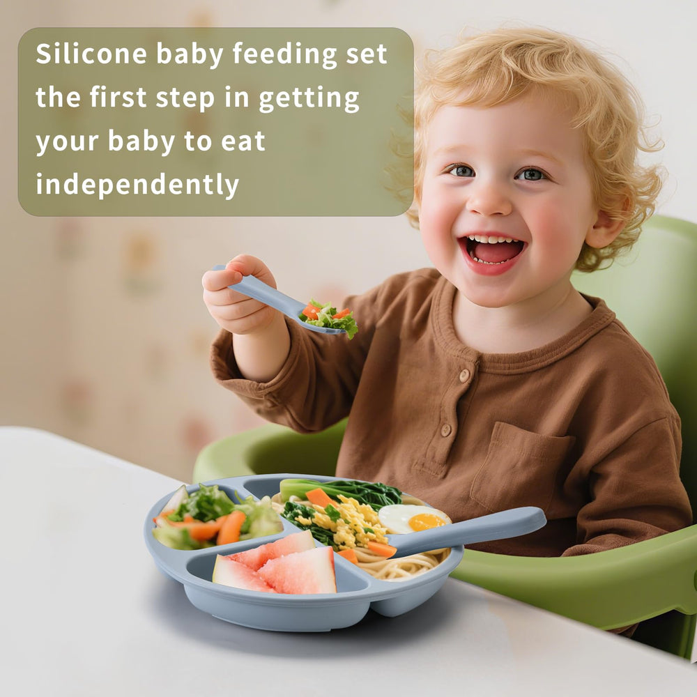 Orghcyi baby feeding scene with toddler utensils in use.