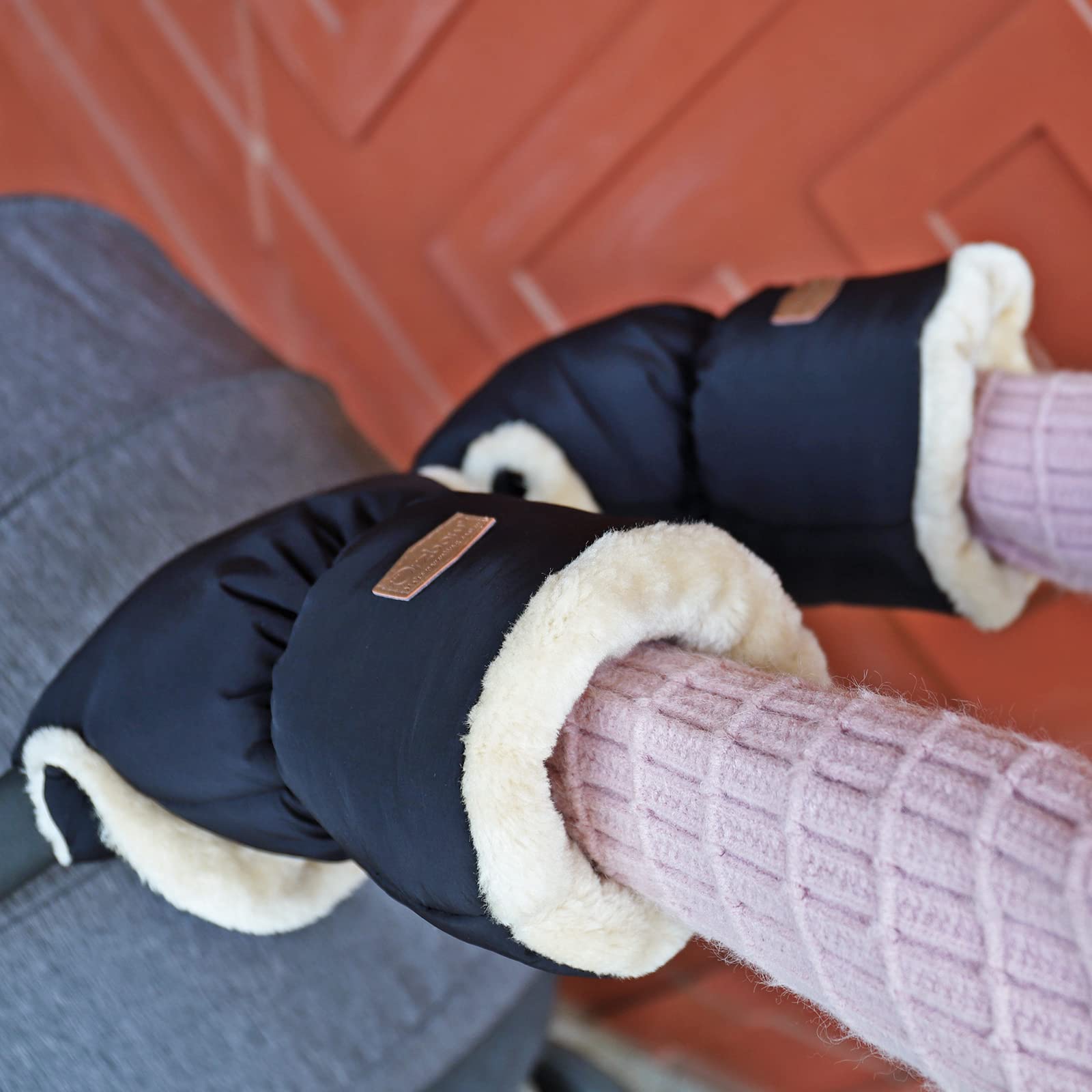 Orzbow glove set inside carrying bag for neat storage after use.