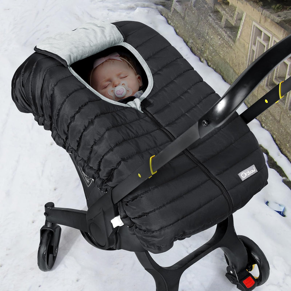 Orzbow Winter Car Seat Cover folded in a diaper bag demonstrates travel convenience