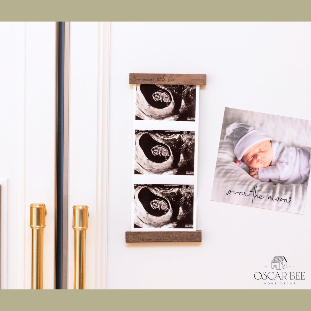 Oscar Bee ultrasound frame with magnetic back enables easy fridge display.