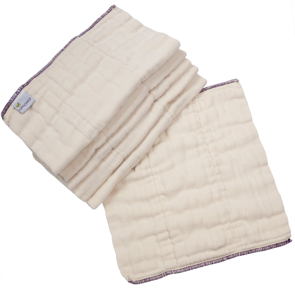 OsoCozy Better Fit small prefold tri-fold inside a diaper cover for quick changes.