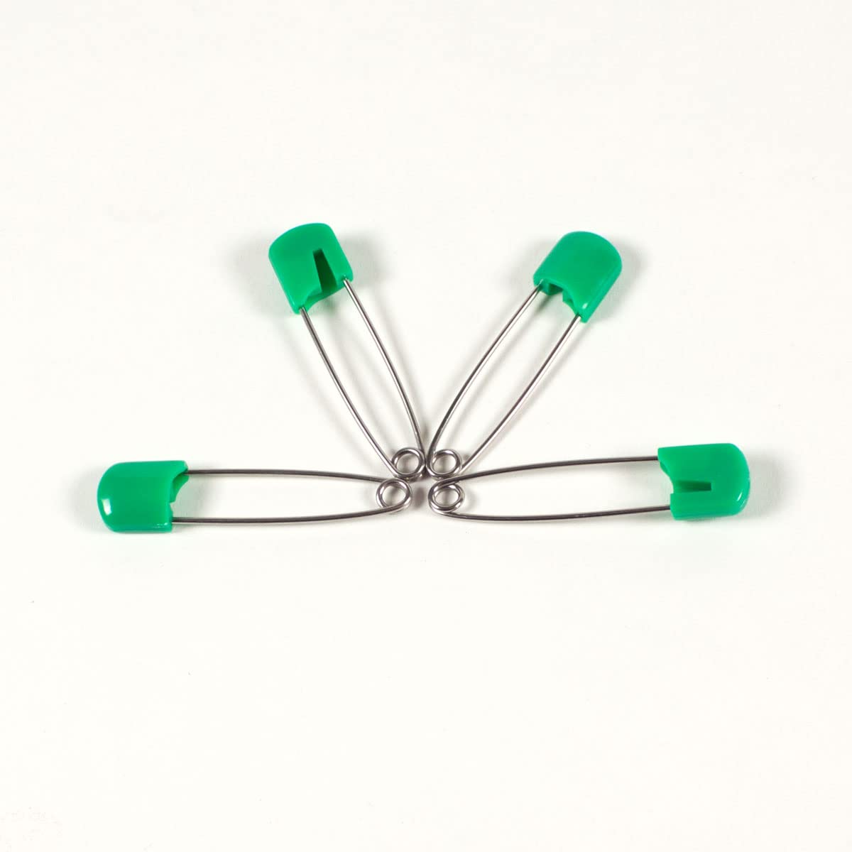OsoCozy locking head nappy pin demonstrates secure fastening during washing