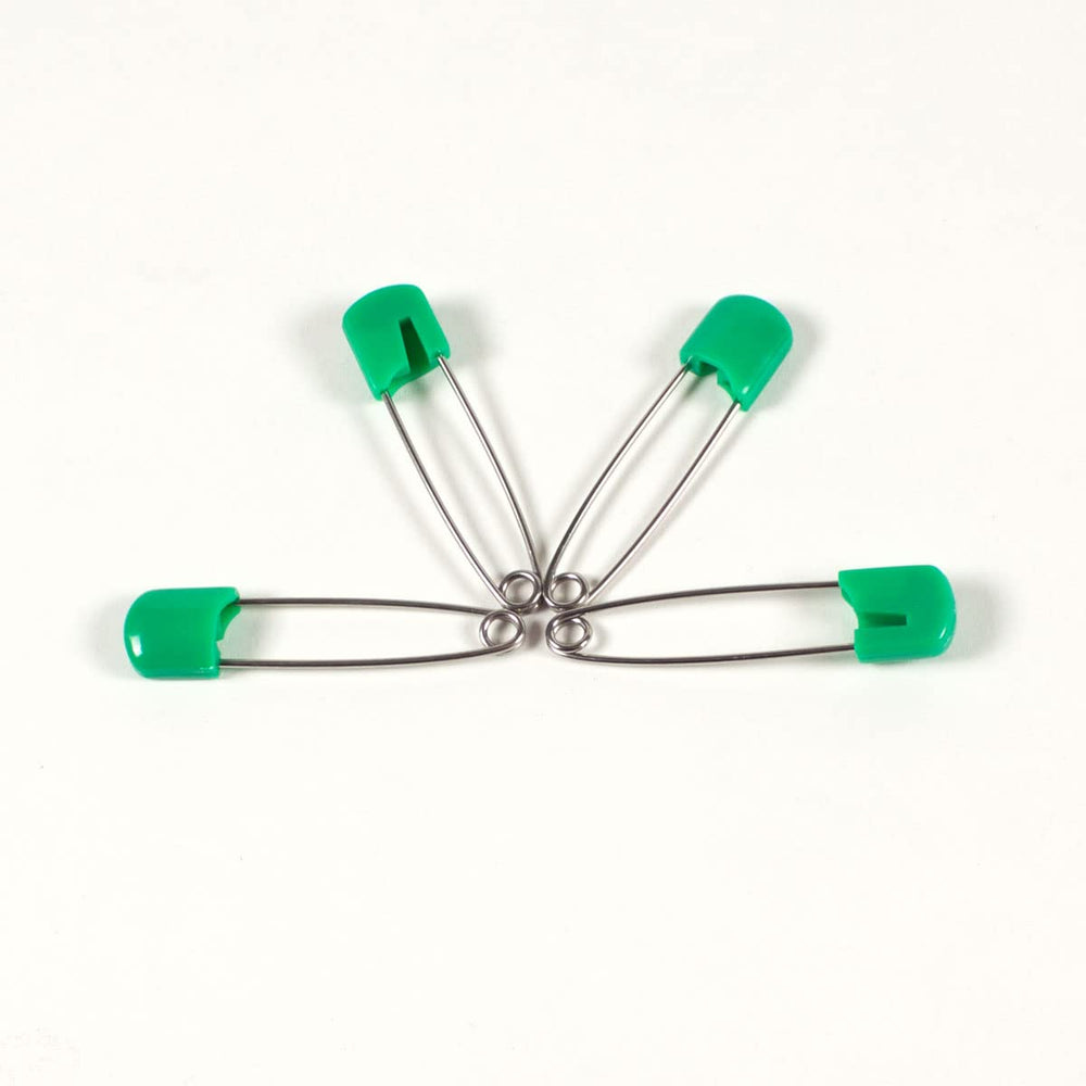 OsoCozy locking head nappy pin demonstrates secure fastening during washing