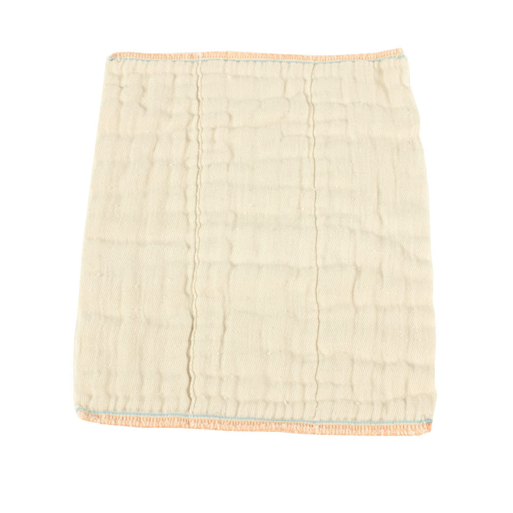 OsoCozy unbleached prefold diapers flatlay highlights softness and natural cotton texture
