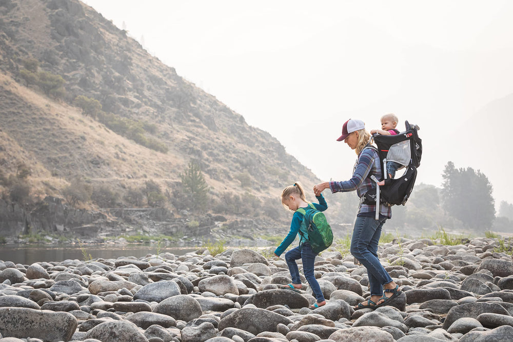 Osprey Poco family-use during park hike Starry Black shows versatility.