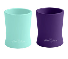 OtterLove silicone baby cup shows easy-grip handle for tiny hands during feeding sessions.