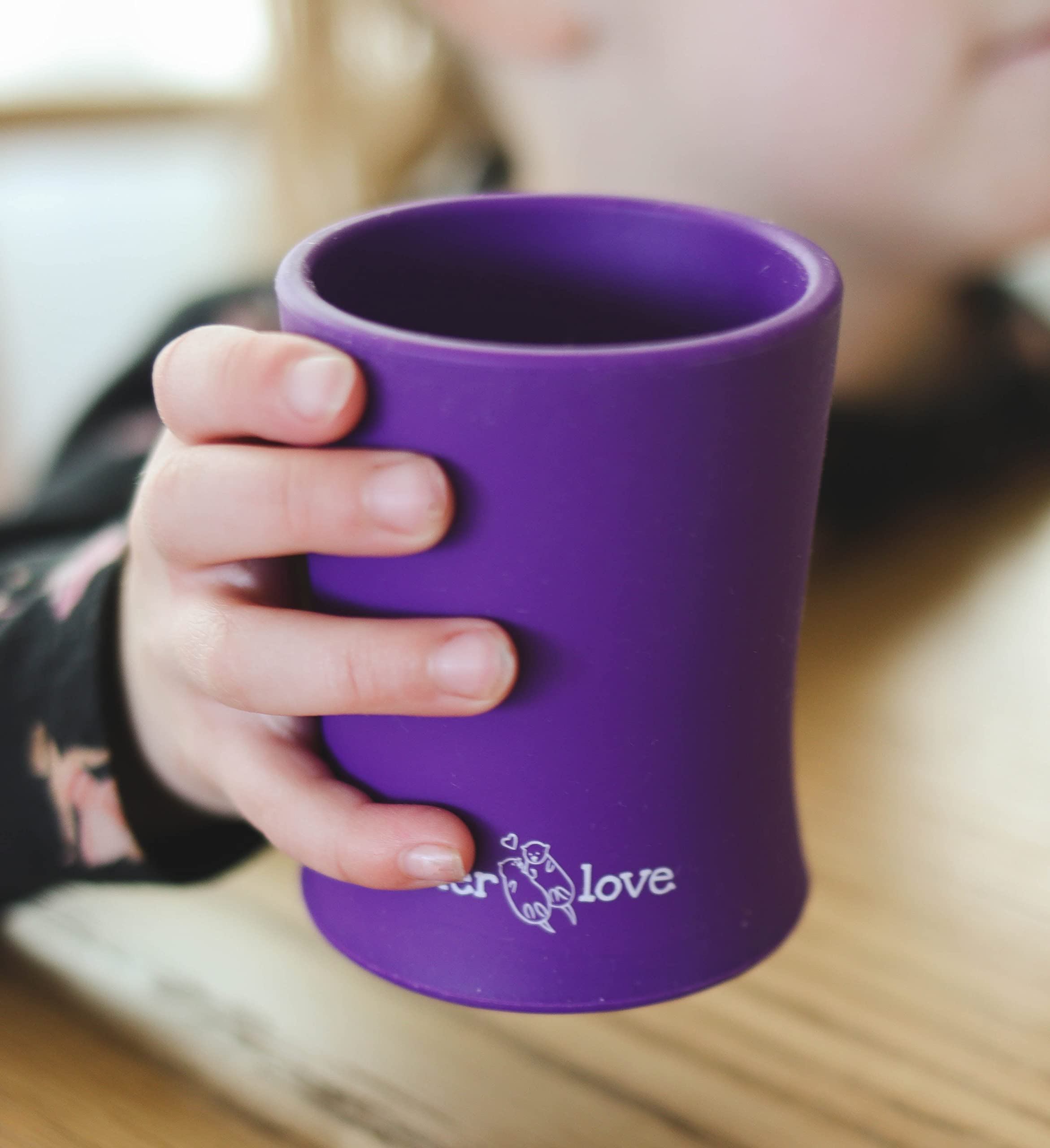 OtterLove training cup top view showcases stable wide base to reduce spills.