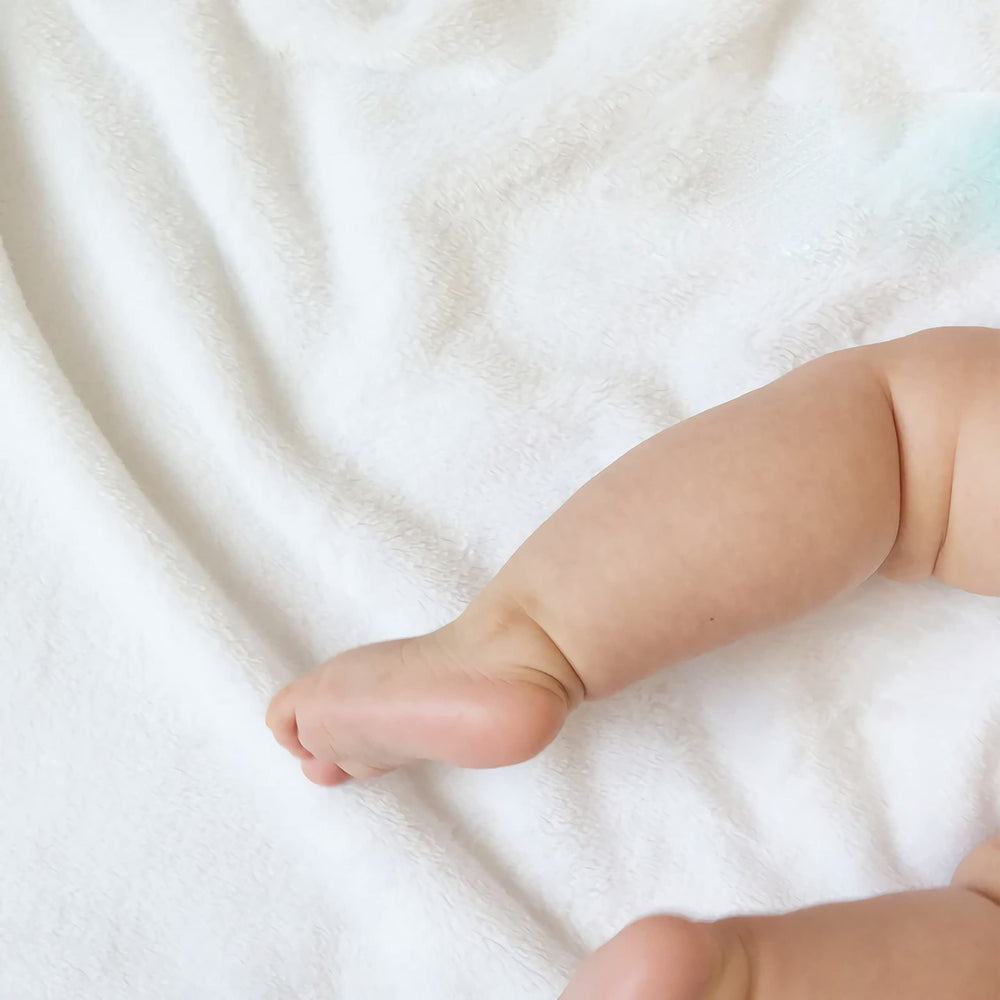 Ottoy blanket on lap for naps, reading, or movie nights.