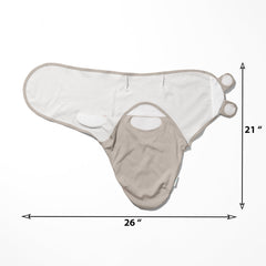 Ouch Baby Nordic Edition swaddle on newborn promotes a calm, secure sleep cue.