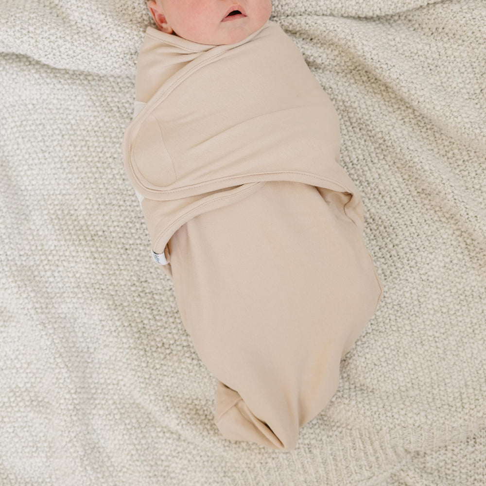 Ouch Baby organic cotton swaddle knit closeup showing breathable fabric for sensitive skin.