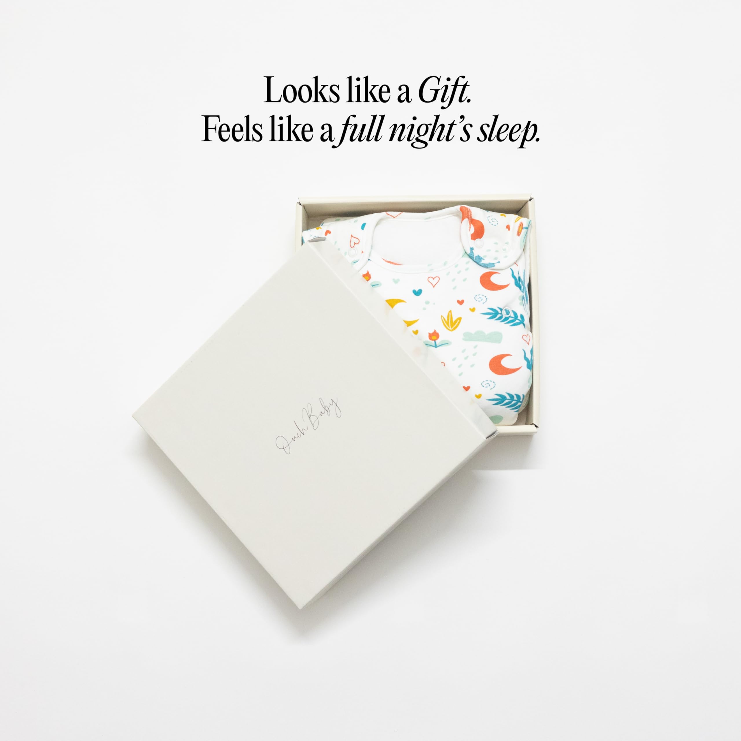 Ouch Baby Sleep Sack on baby in bed illustrates snug, comfortable sleep environment.