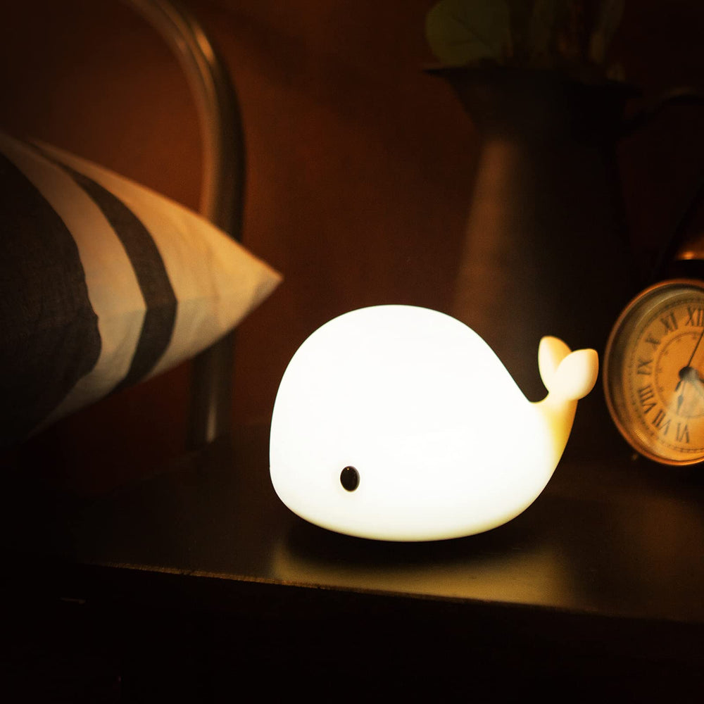 OURRY cute whale night light offers kid-friendly glow for night-time comfort.