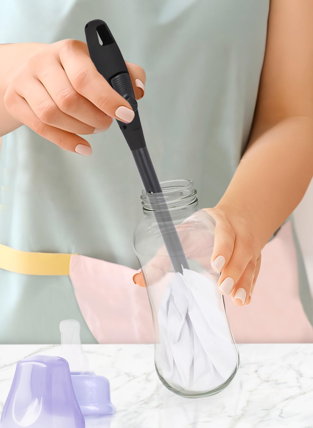 Outta Space Bottle Drying Wand inserted inside a baby bottle for fast moisture removal.