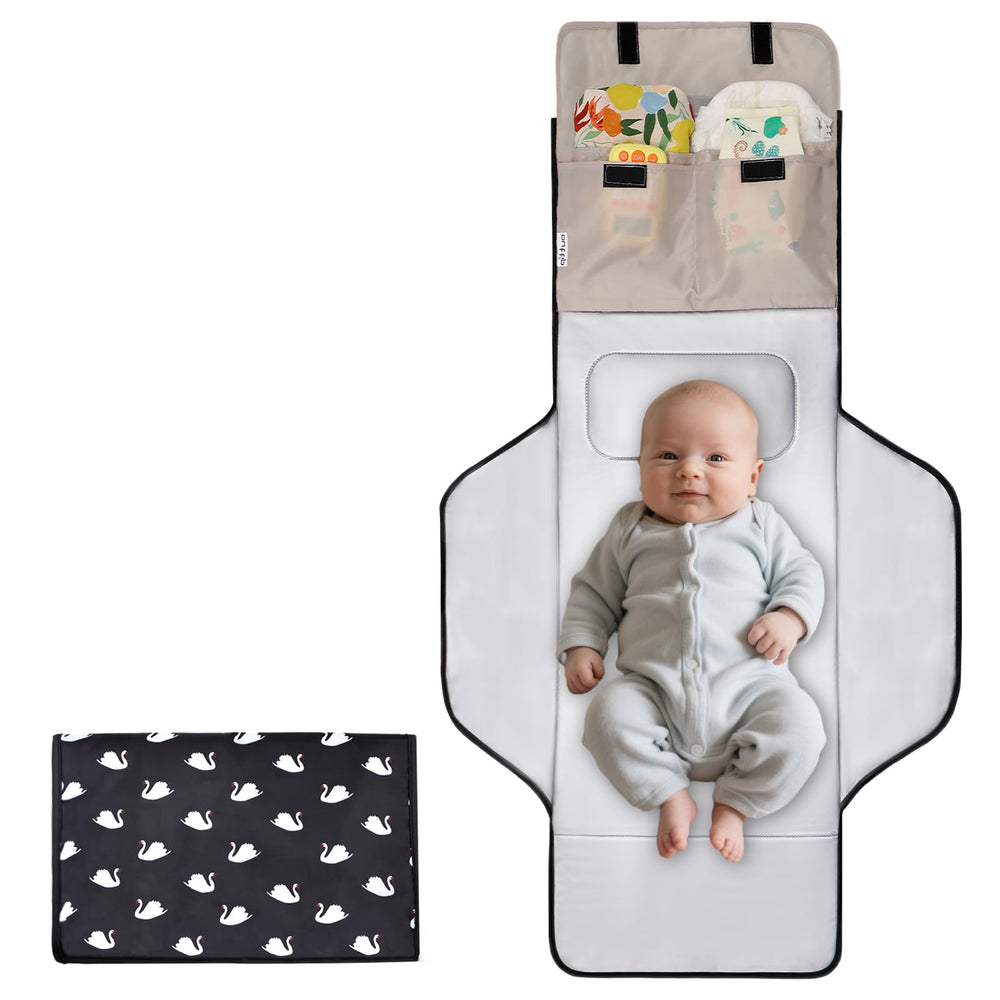 Outtip changing pad folded compact: travel-friendly and quick clean-up.
