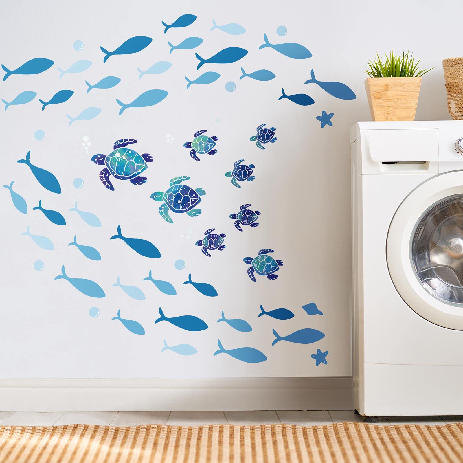 Outus blue fish wall decor set adds vibrant underwater motion to any space.