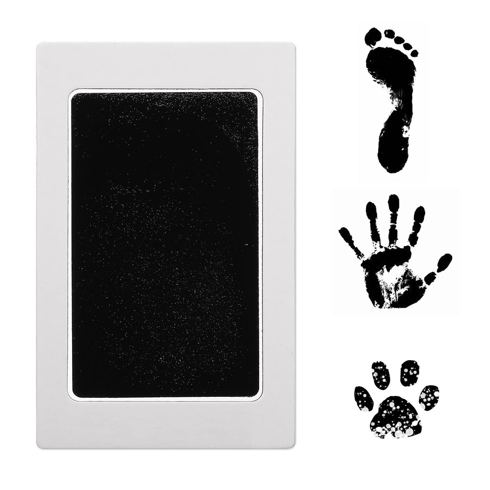 Outus Clean Touch ink pad footprint close-up with tiny feet imprint on card
