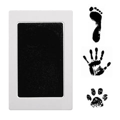 Outus Clean Touch ink pad footprint close-up with tiny feet imprint on card