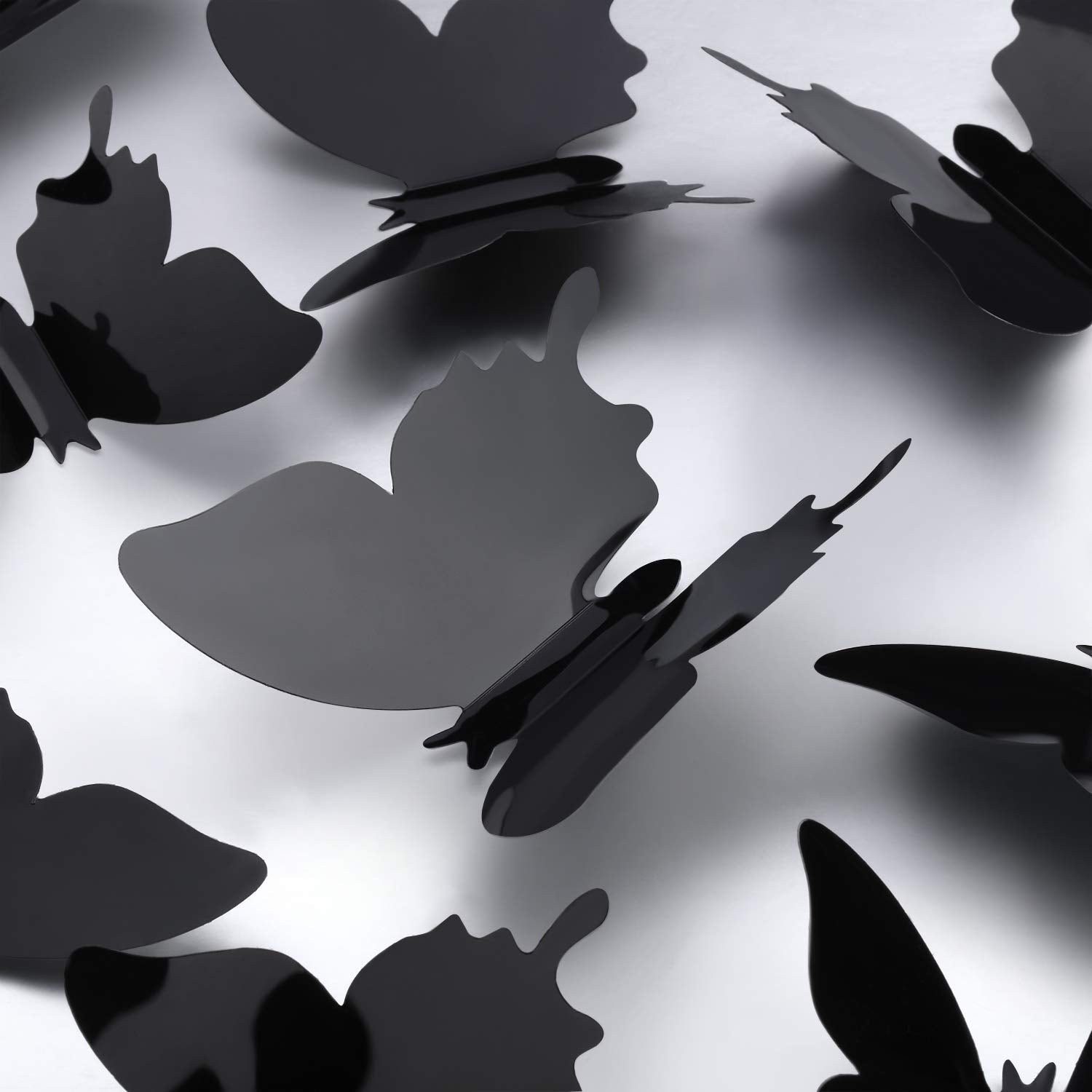 Outus removable butterfly wall decals in black for flexible decorating.