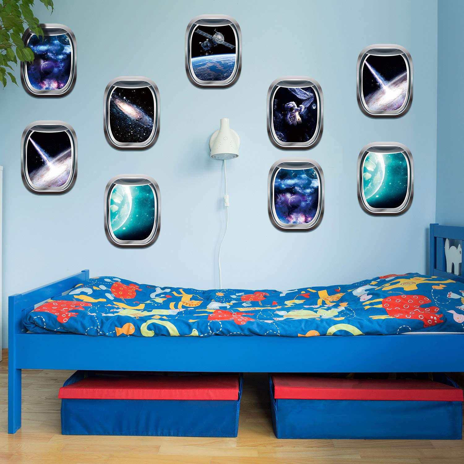 Outus space capsule decal adds moon and celestial elements to nursery decor