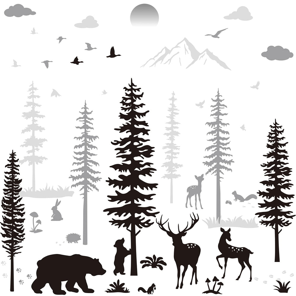 Outus winter forest pine trees wall decal adds cozy woodland vibe to kid's room.