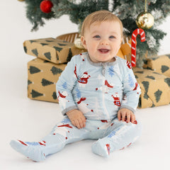 Owlivia zip-front closure on baby pajamas enabling quick diaper changes