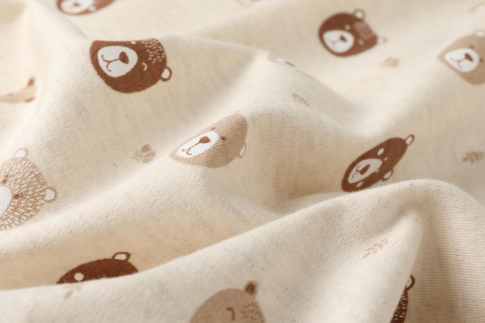 Owlivia wearable blanket features safety tab to protect delicate skin during use.