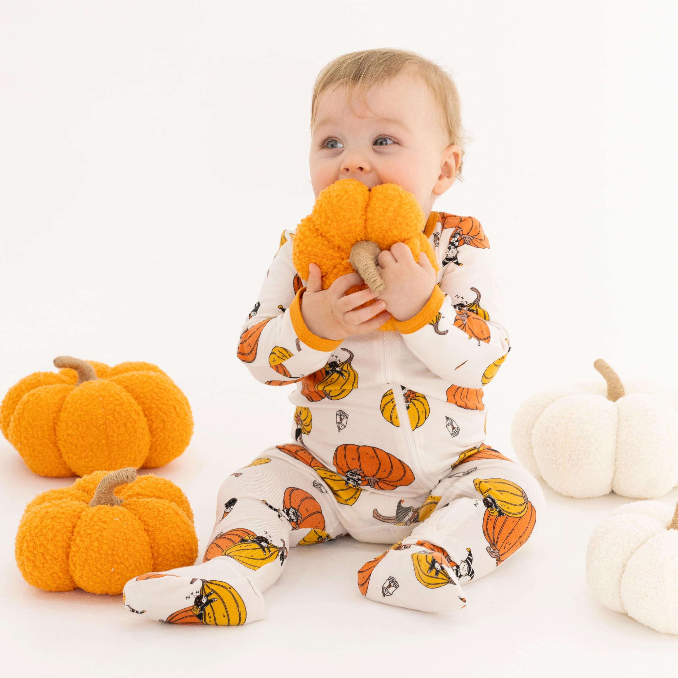 Owlivia boys and girls footed sleeper in orange bat pumpkin for warmth