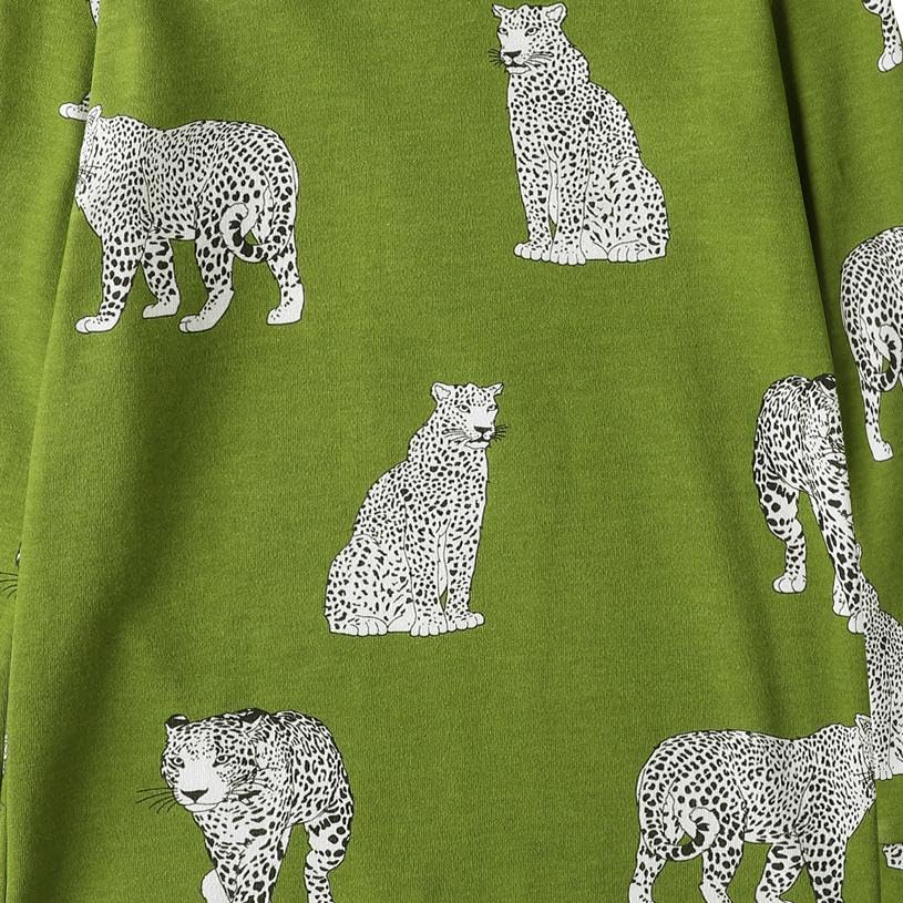 Owlivia cheetah-stripes fabric close-up; ultra-soft organic cotton texture.