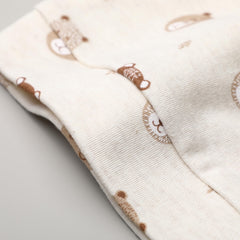 Owlivia brown organic knot hat keeps tiny head cozy.