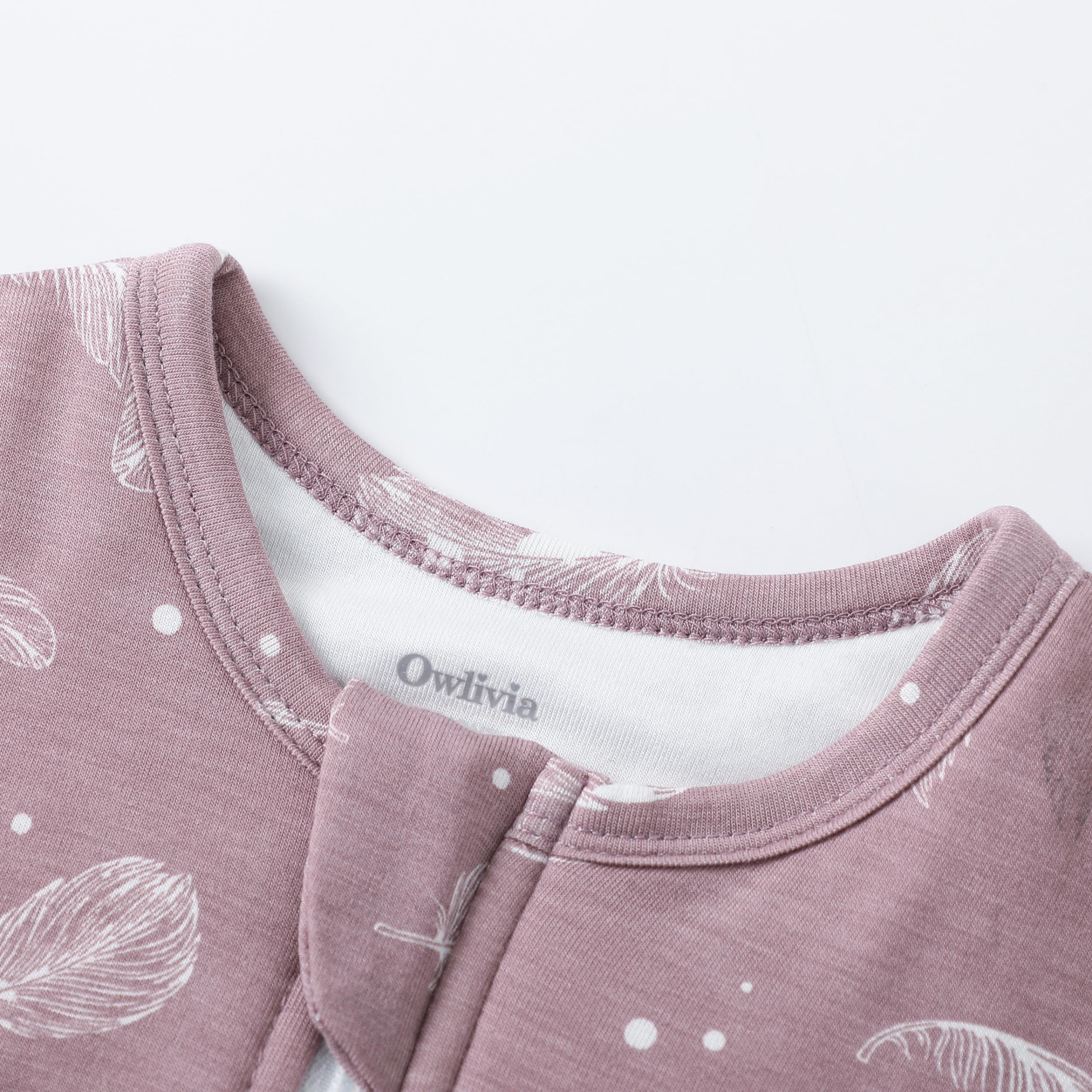 Owlivia sleep sack featuring a 2-way zipper for easy diaper changes.