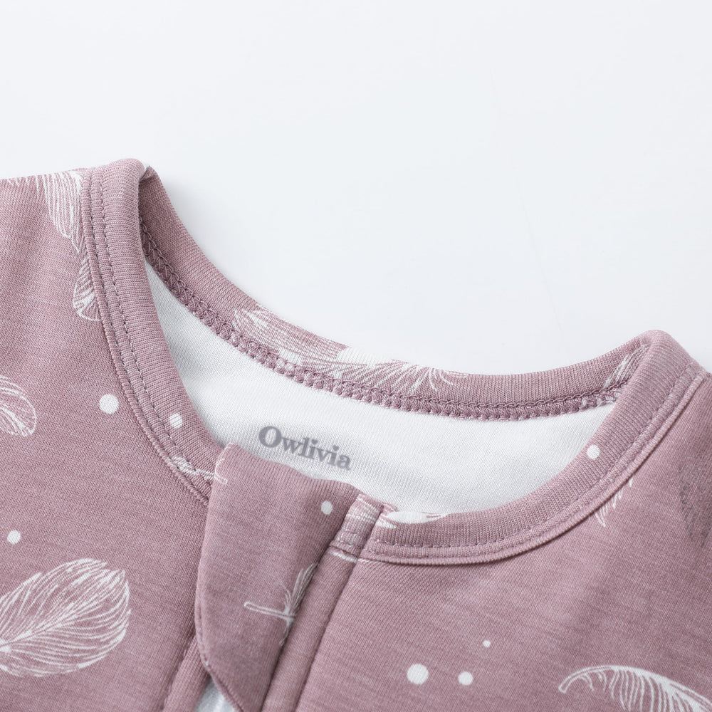 Owlivia sleep sack featuring a 2-way zipper for easy diaper changes.