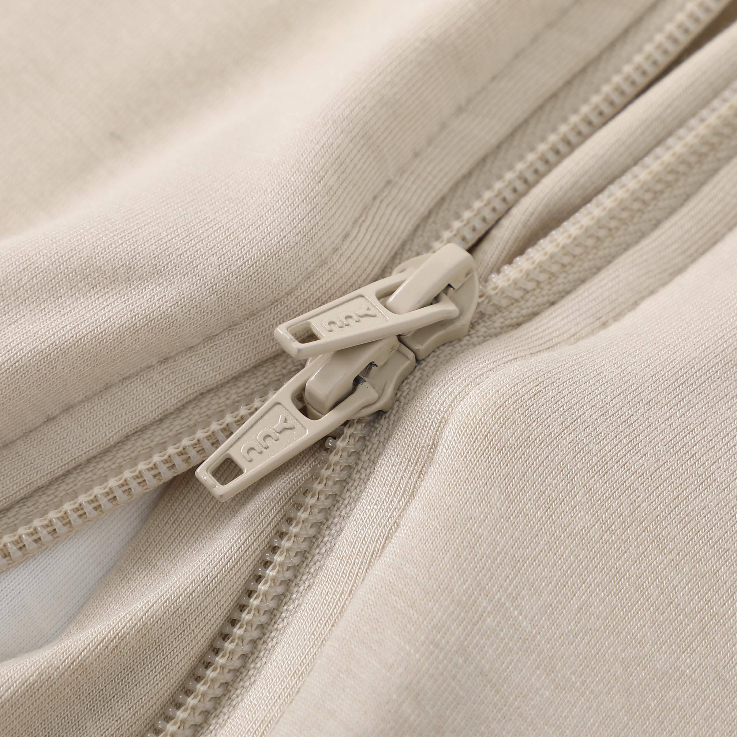 Owlivia sleep sack beige tag notes 1.0 TOG for moderate-room temperatures.