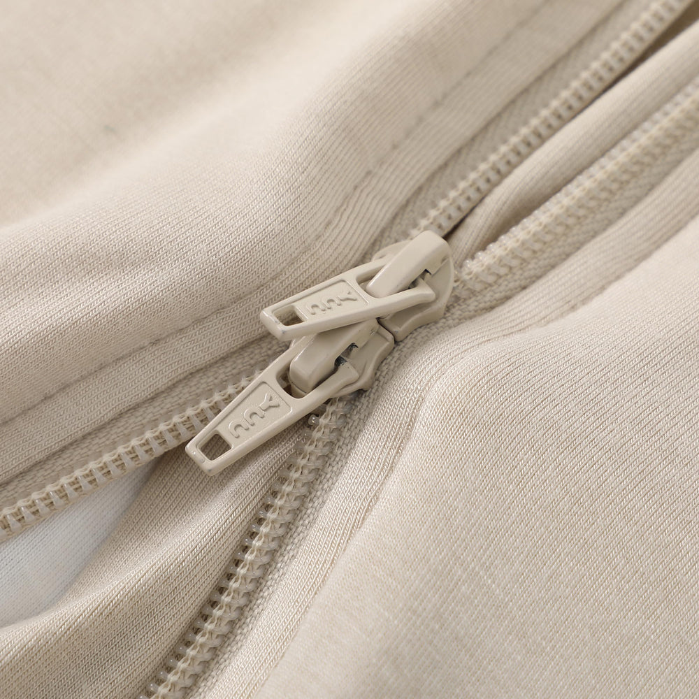 Owlivia sleep sack beige tag notes 1.0 TOG for moderate-room temperatures.