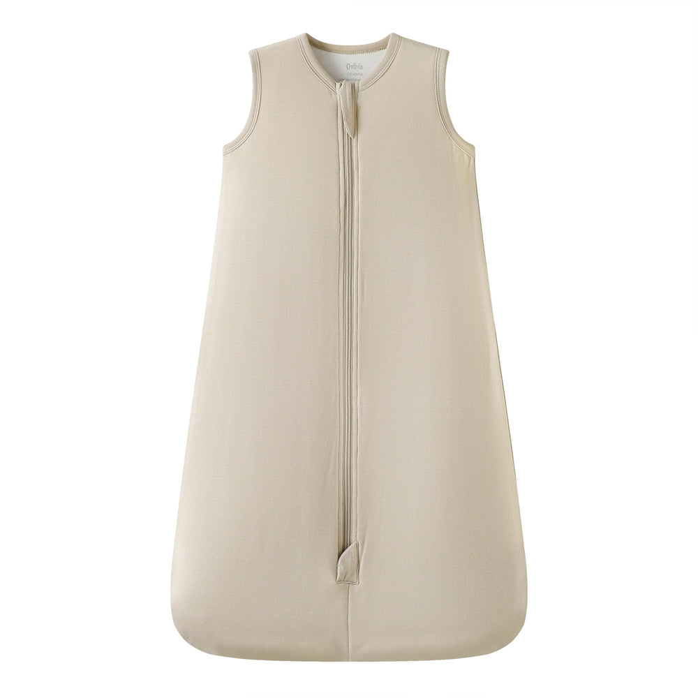 Owlivia sleep sack beige fabric close-up showing soft bamboo rayon blend for gentle skin.