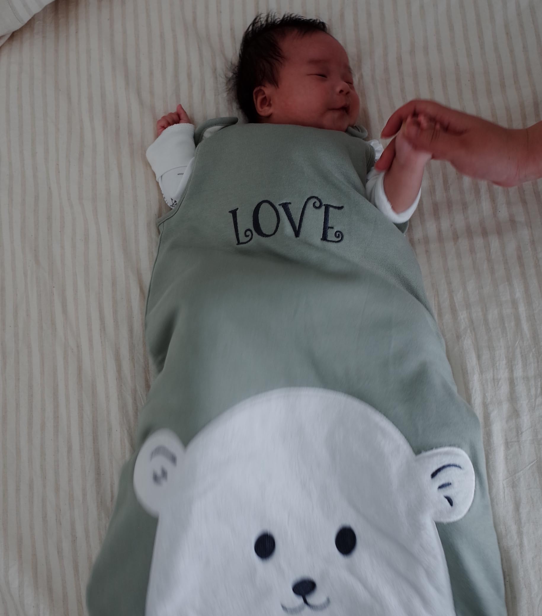 Owlivia Sleep Sack bell shape allows kicking room while keeping baby warm.