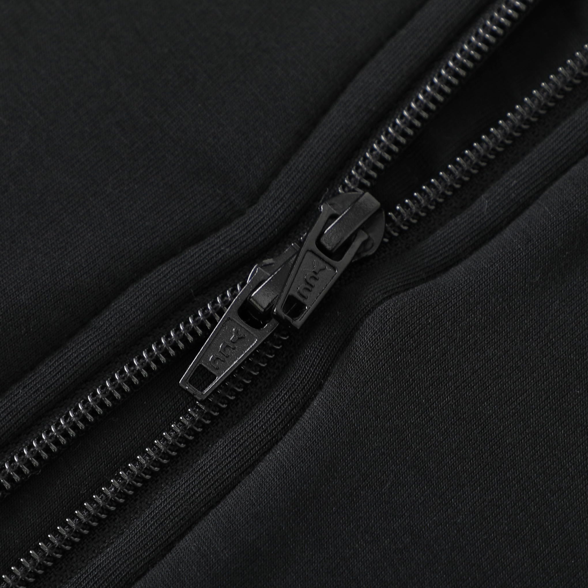 Baby wearing Owlivia sleep sack in black, size 3-12 months.
